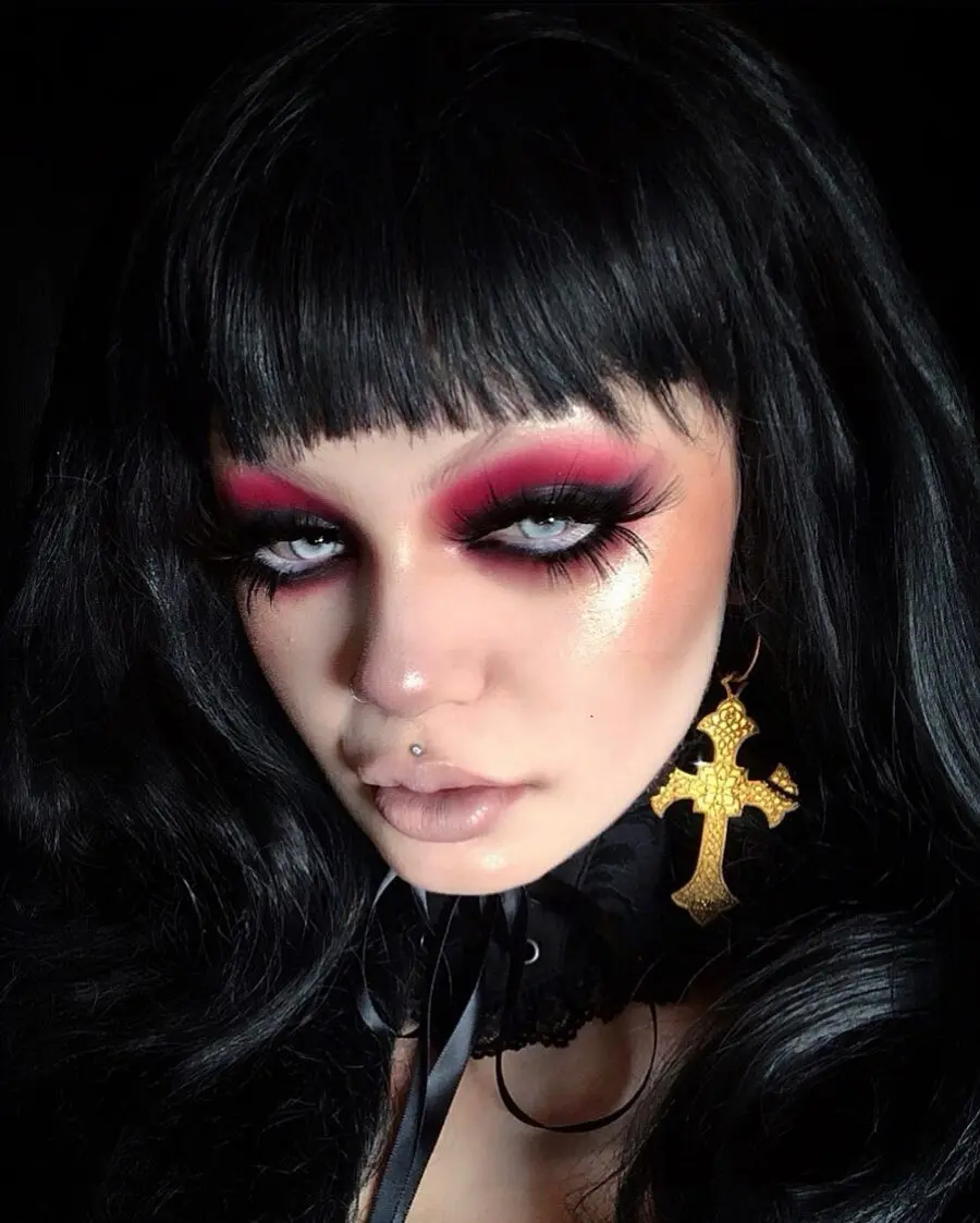 Dramatic doll makeup with bold eyes and lips