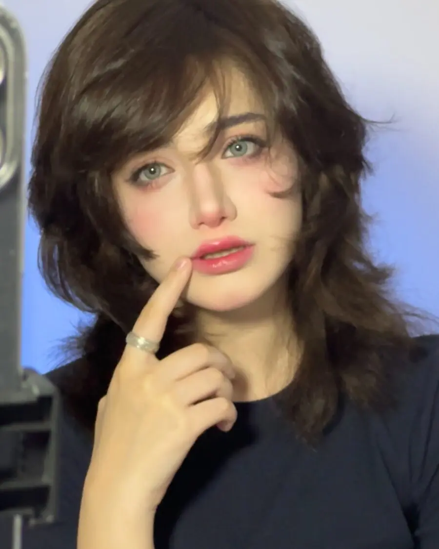 Glamorous doll makeup with expressive features