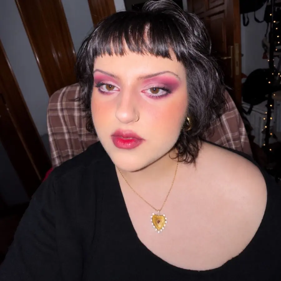 Bold doll makeup with vibrant colors and charm