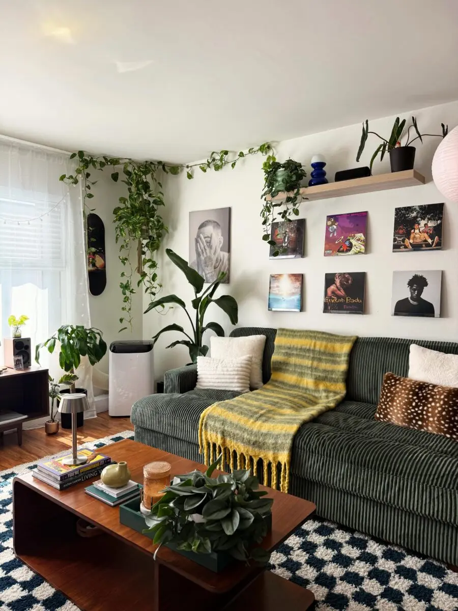 Charming eclectic living room with lush greenery