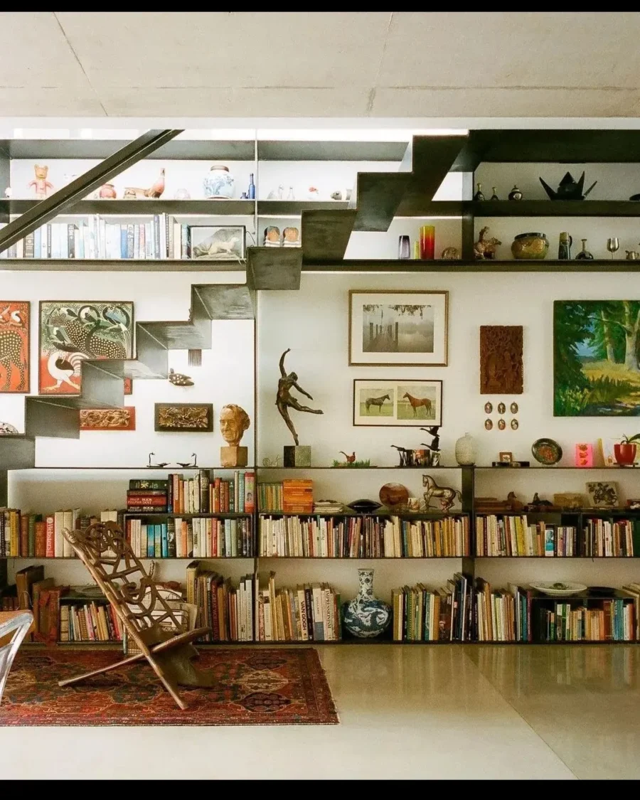 Stylish staircase featuring eclectic decor elements