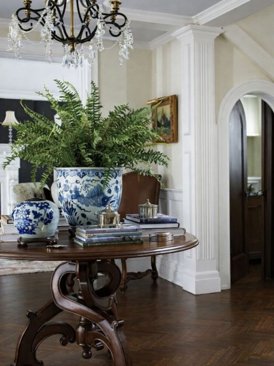 Chic entryway decor with lush greenery highlights