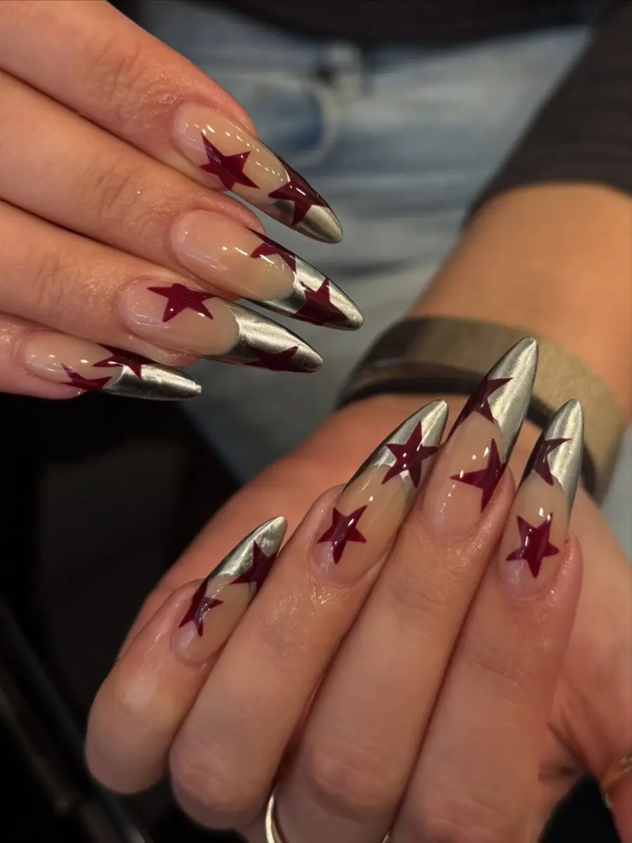Stylish French Tip Nails with Star Accents