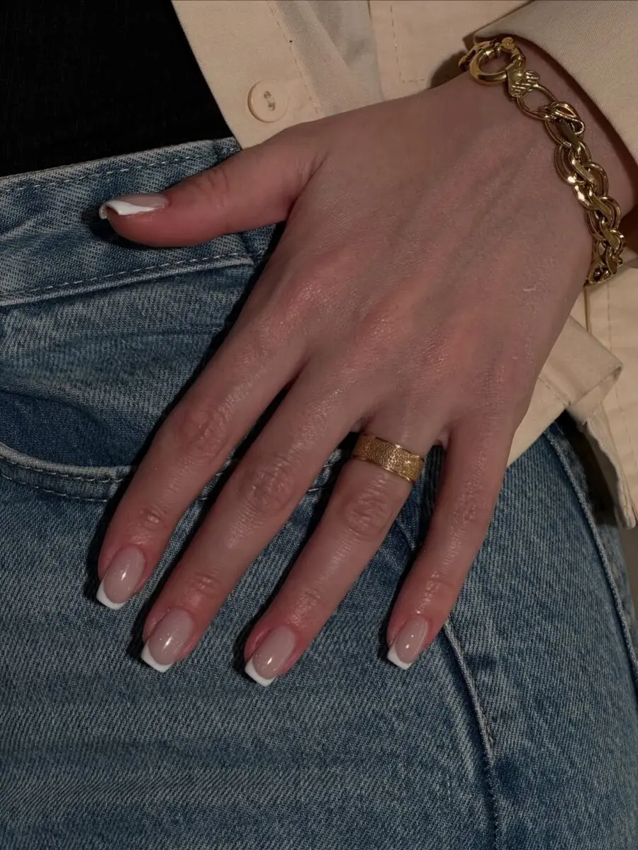 Chic minimalist French tip nail design showcased