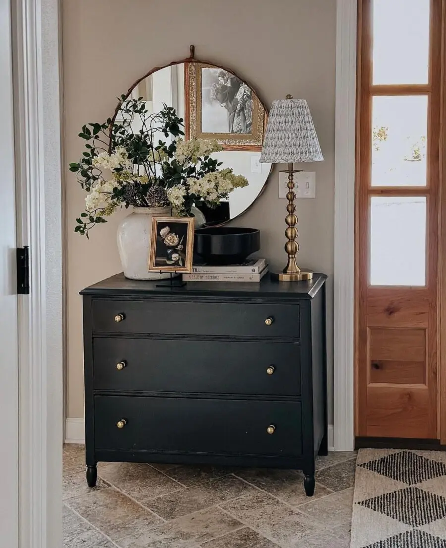 Chic black entryway table with floral accents