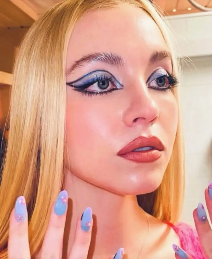 Bold Blue Eyeliner and Glossy Glam