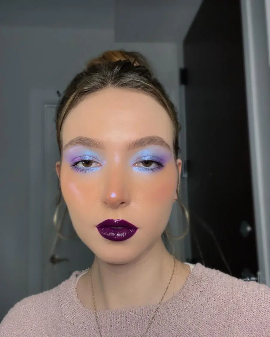 Vibrant lavender hues meet glossy lips.