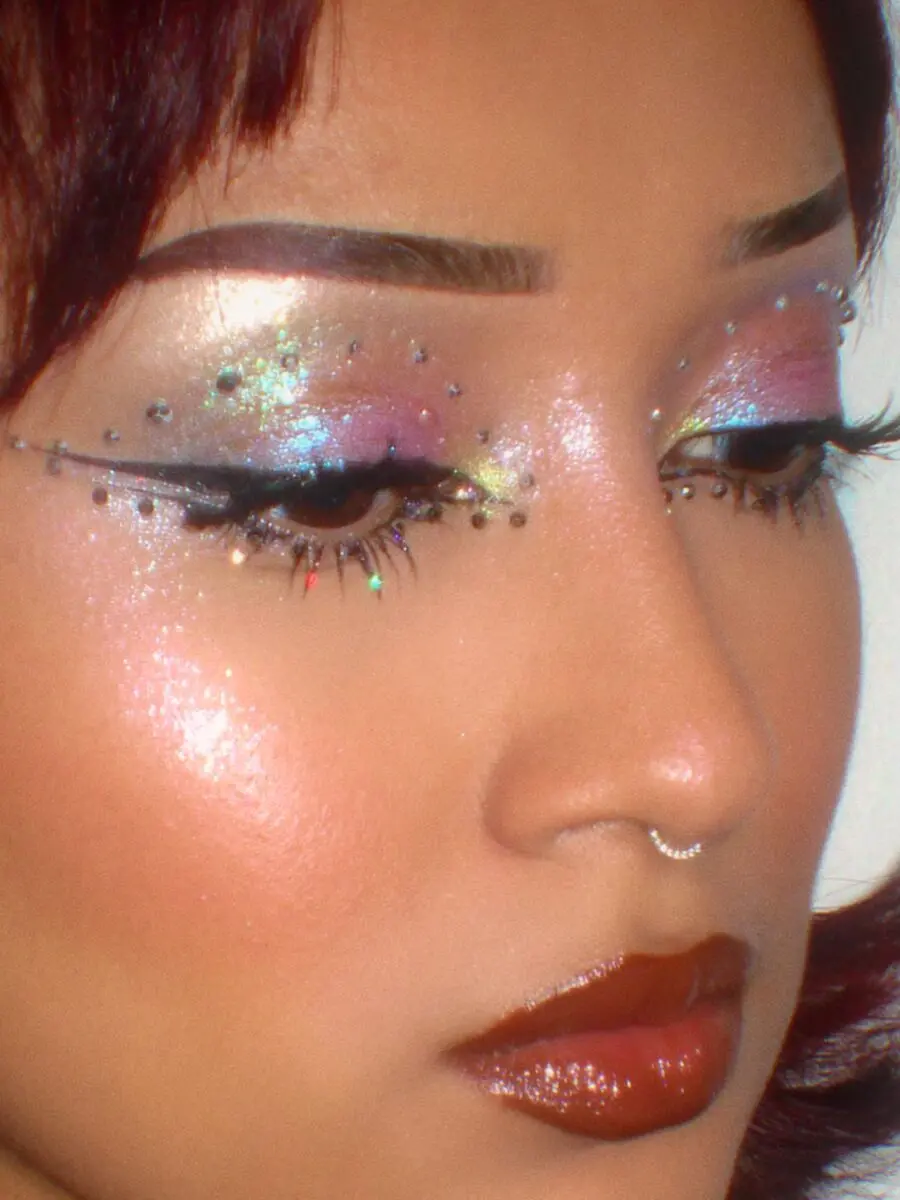 Radiant and playful iridescent eye makeup look