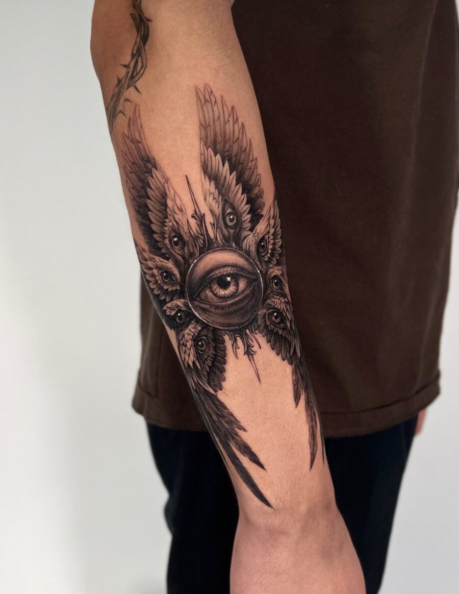 Detailed winged eye tattoo design concept