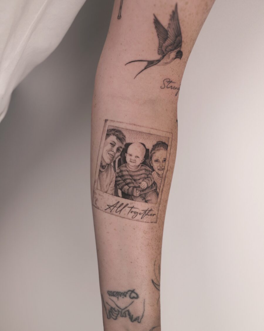 Tribute tattoo featuring cherished family photo