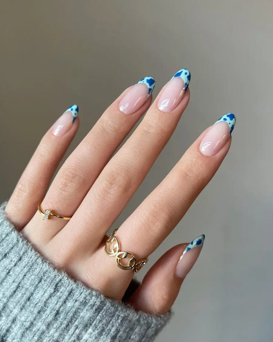 Stylish French Tips with Blue Spot Accents