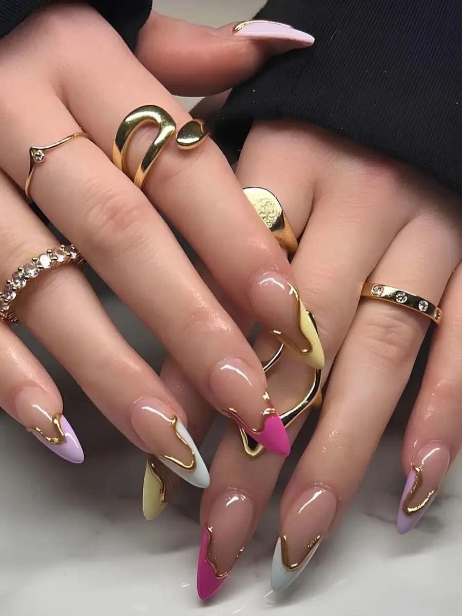 Trendy French Tip Acrylic Nails with Gold Accents