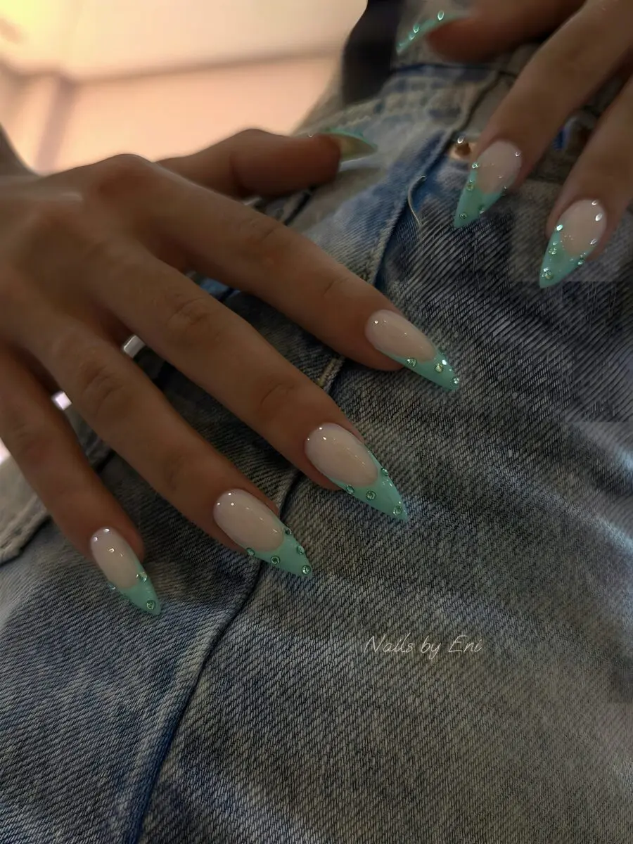 Stylish mint green French tip acrylic nails