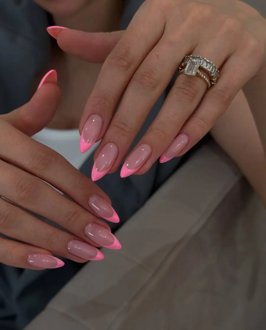 Vibrant pink French tip acrylic nails