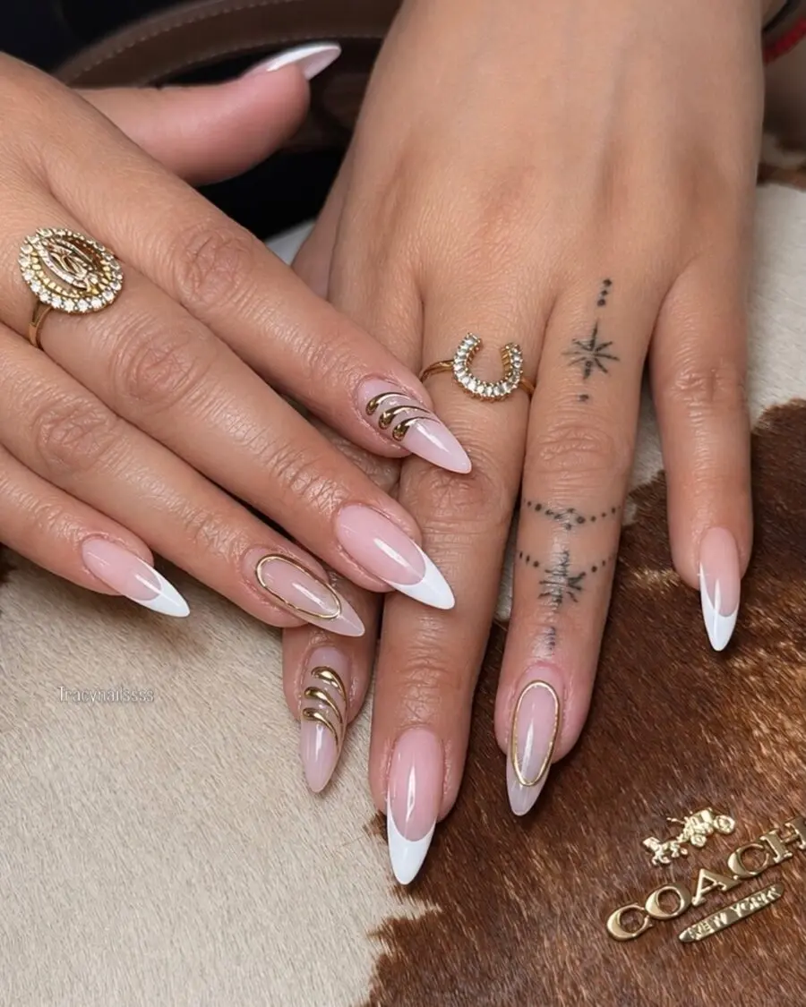 Elegant French Tip Acrylic Nails with Gold Accents