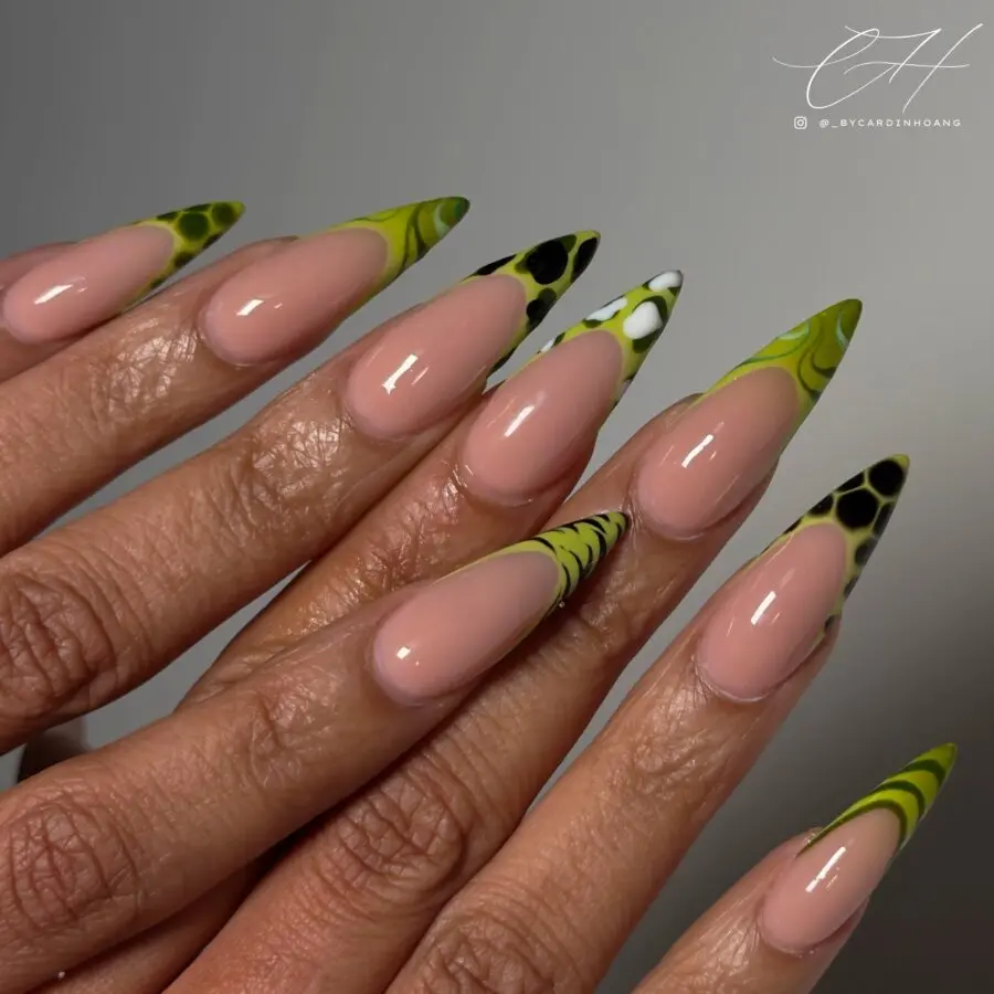 Unique French Tip Nails with Bold Green Accents