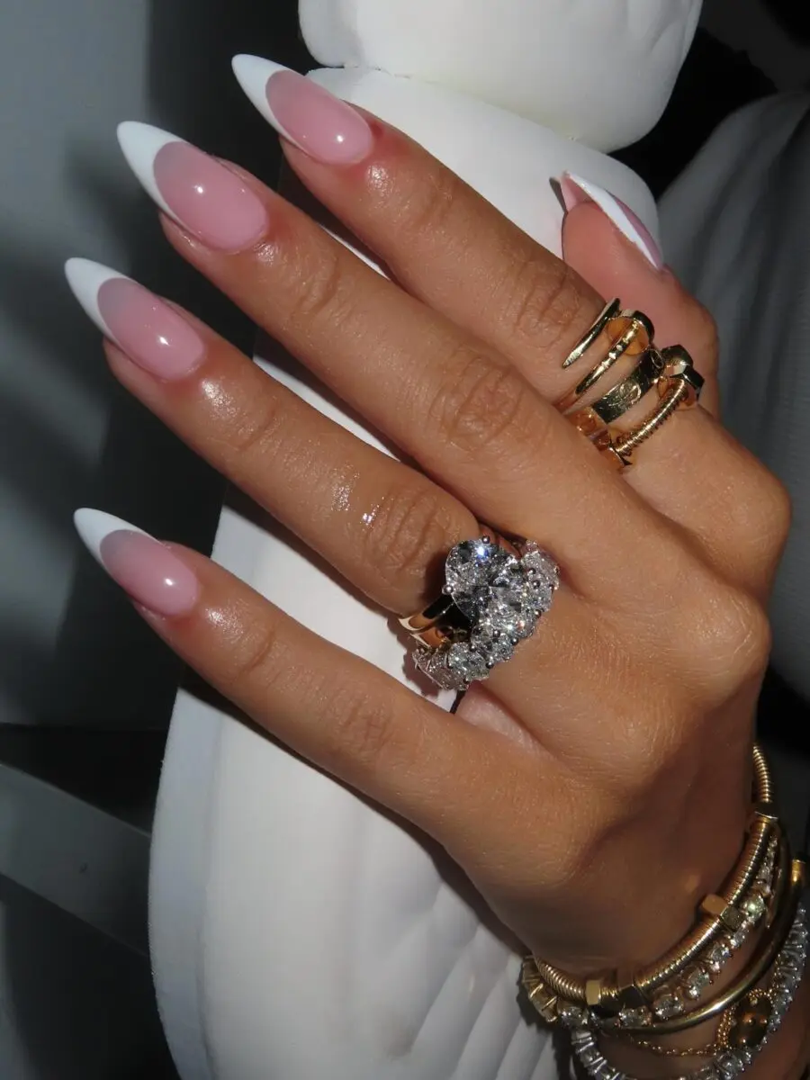 Chic French Tip Acrylic Nails on Elegant Hand
