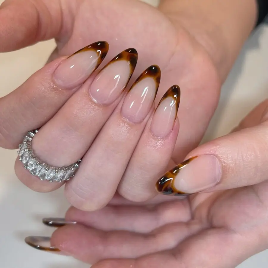 Chic Tortoiseshell French Tip Acrylic Nails
