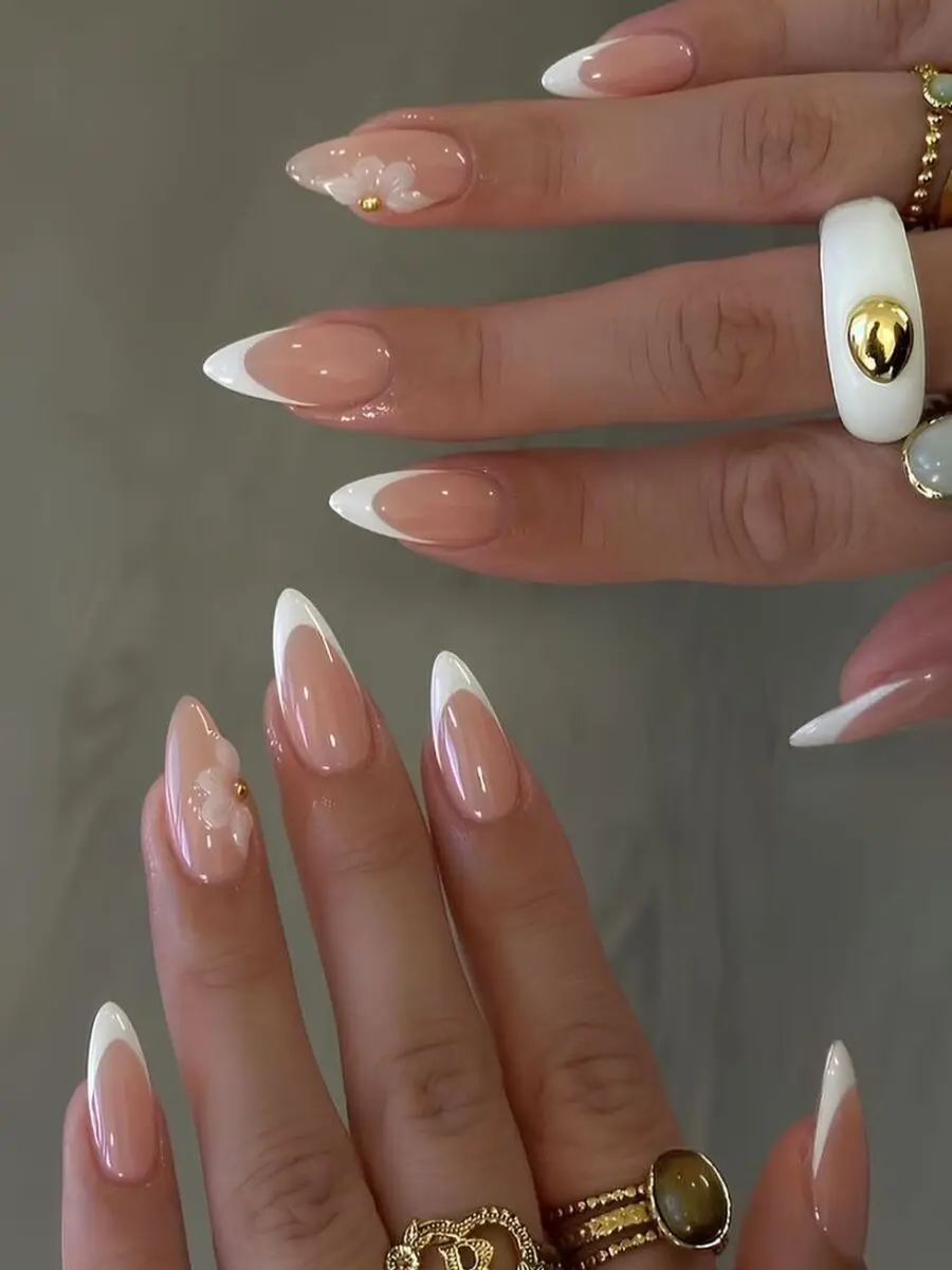 Chic French Tip Acrylic Nails with Floral Details