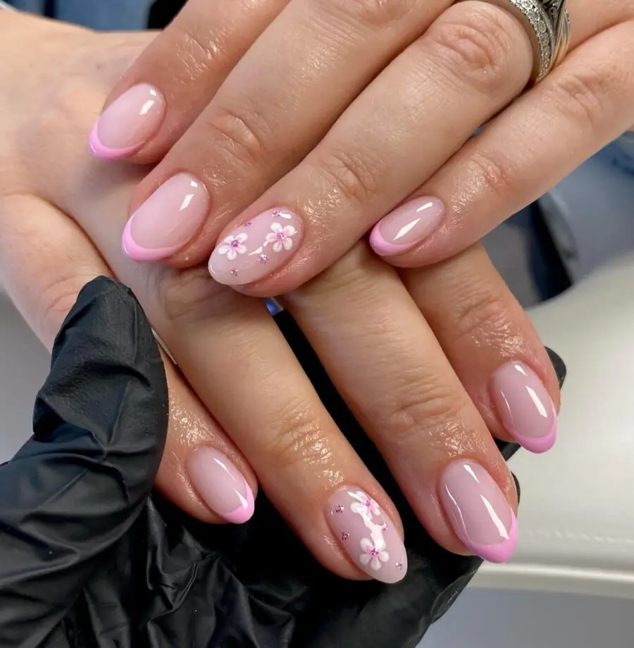 Chic French Tip Acrylic Nails with Floral Accents