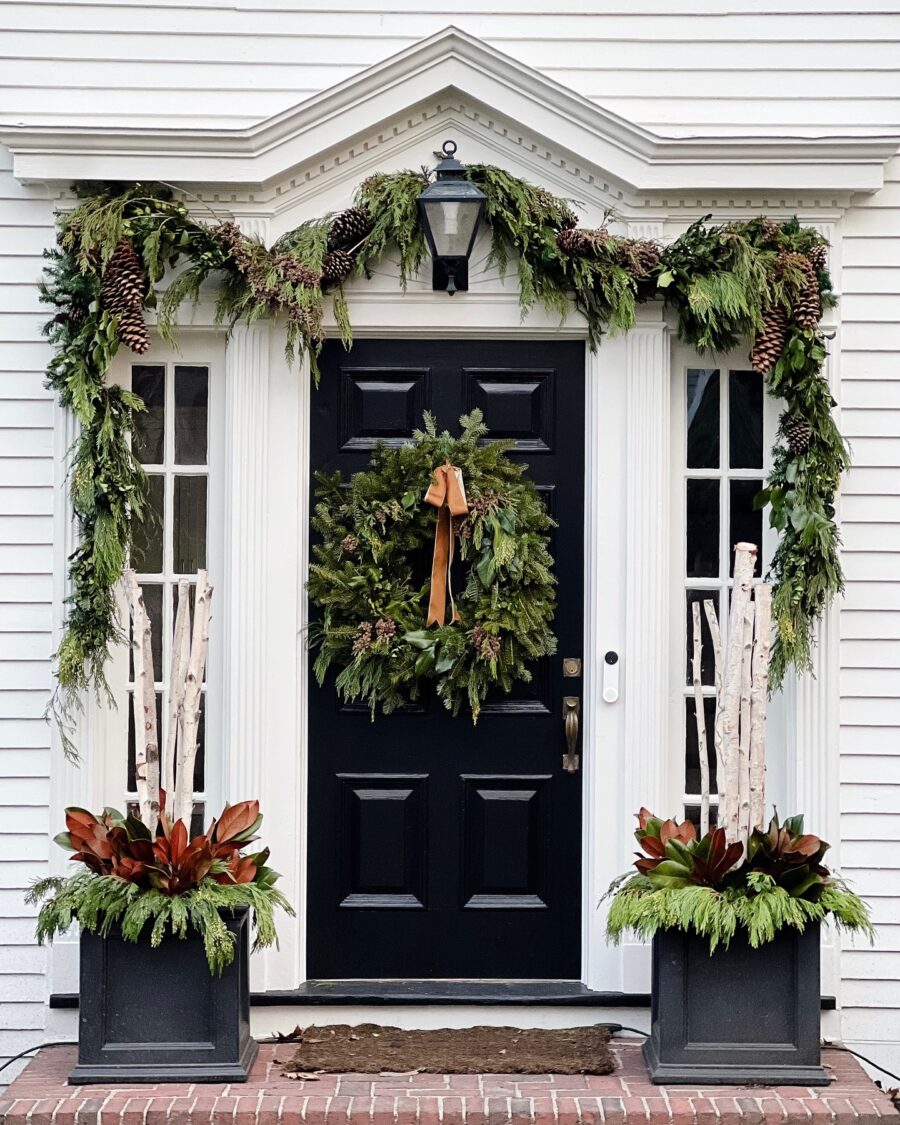 Charming winter front door decor with natural elements
