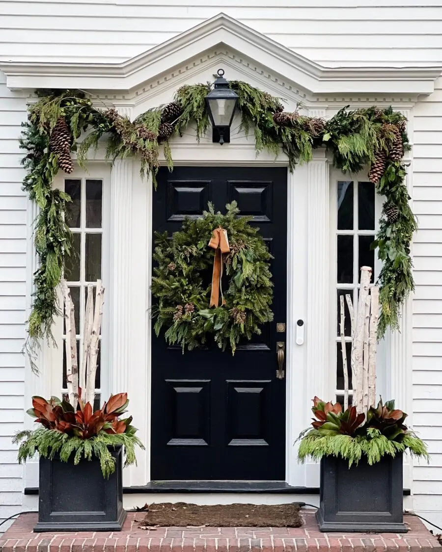 Charming winter front door decor with natural elements