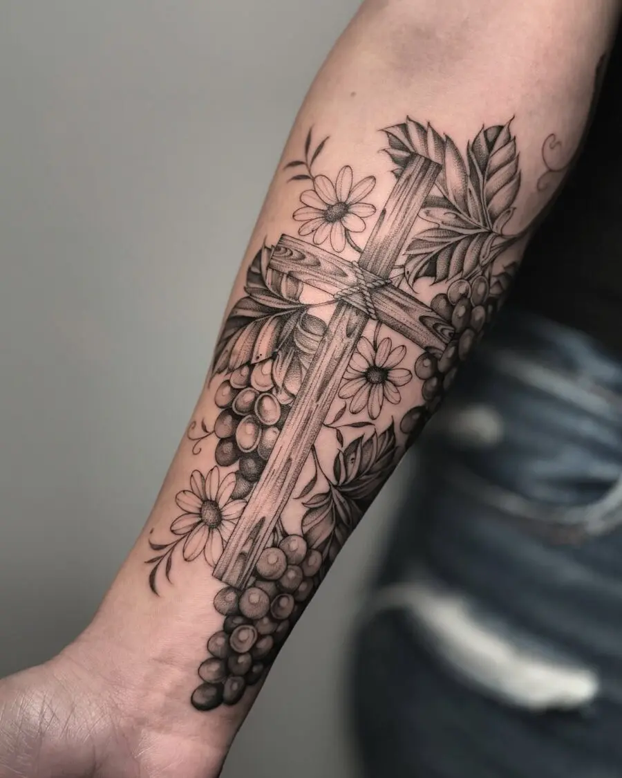 Elegant cross with grapes and flowers tattoo