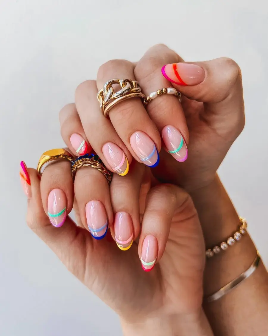 Vibrant French Tips with Colorful Accents