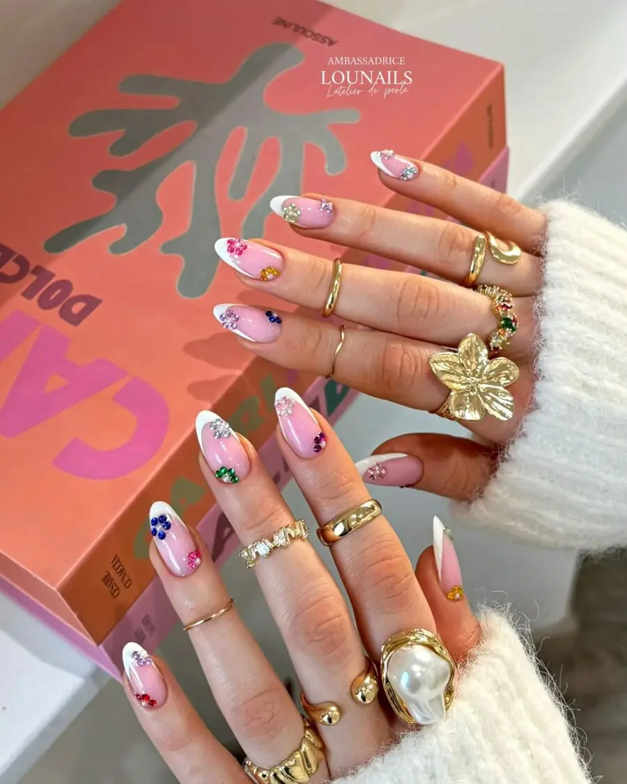Chic Pink Nails with Floral Art and Sparkles