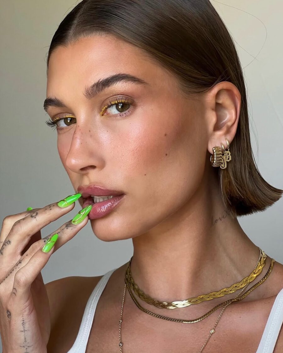 Vibrant green nails for a bold style statement