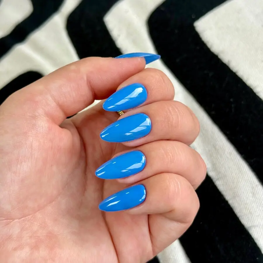 Bold blue stiletto nails in classic style