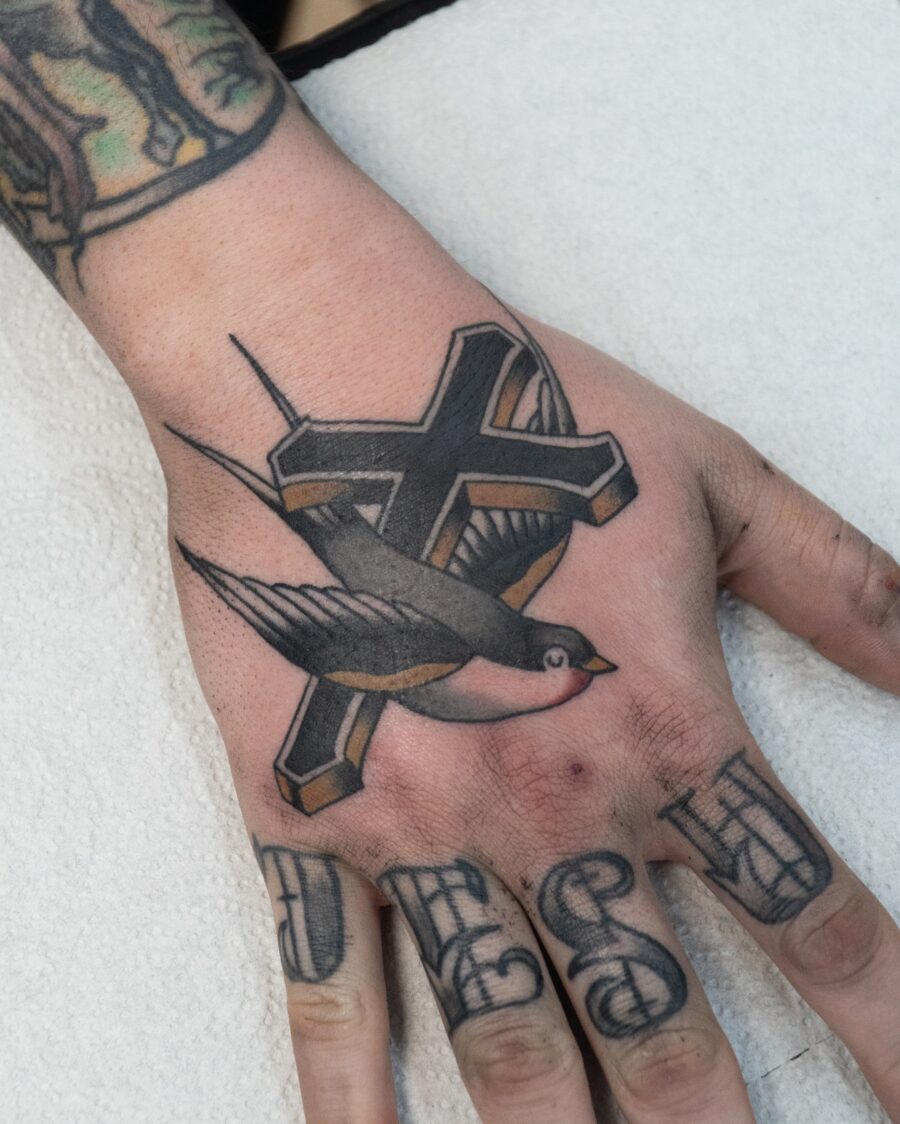 Symbolic tattoo blending faith and freedom