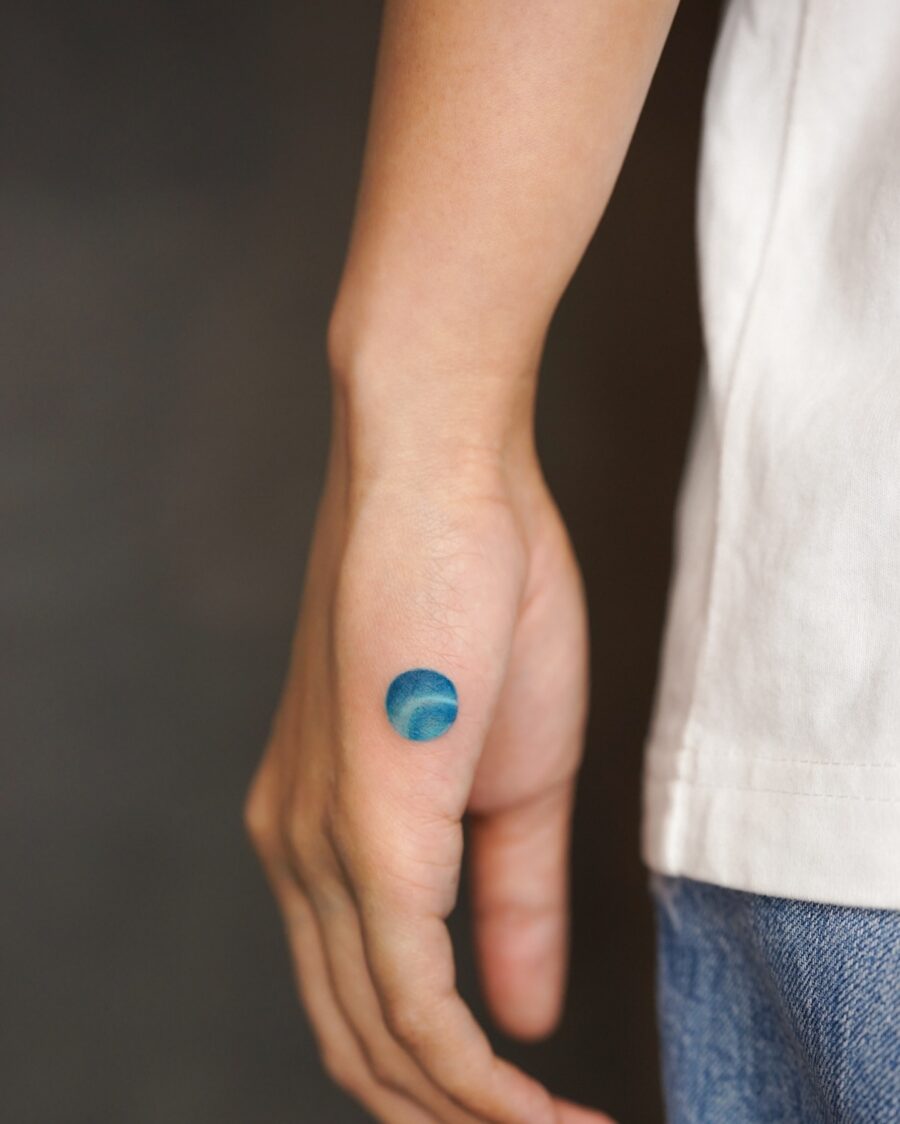Subtle Blue Tattoo on Inner Forearm