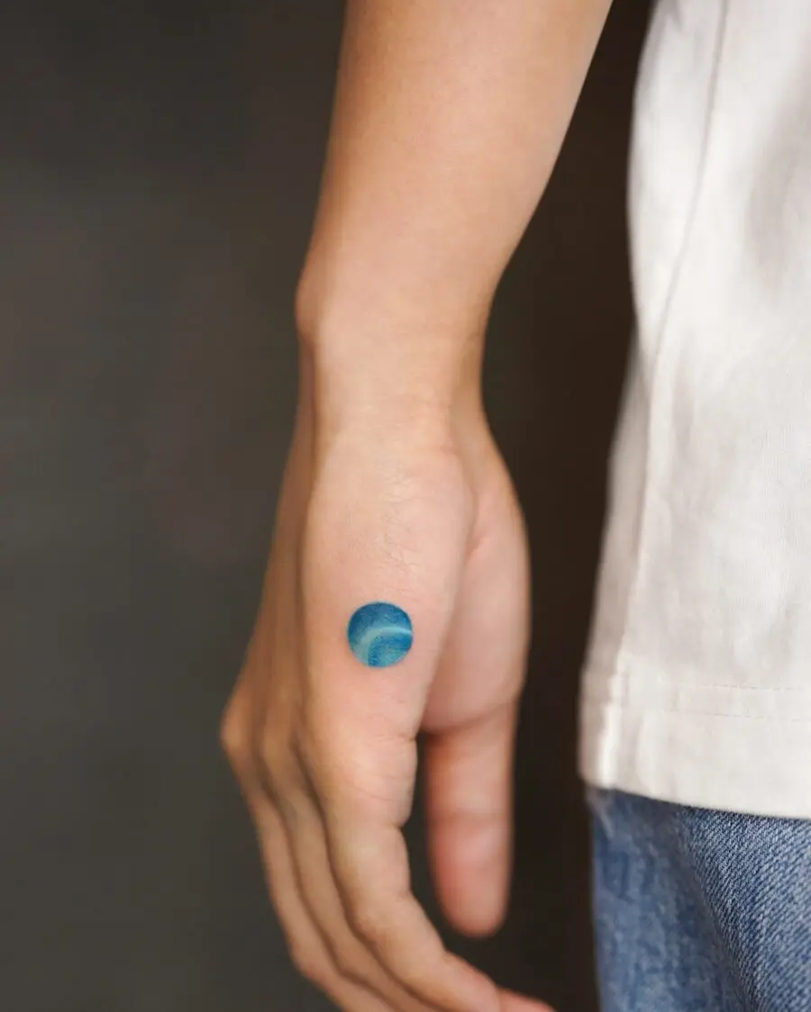 Subtle Blue Tattoo on Inner Forearm