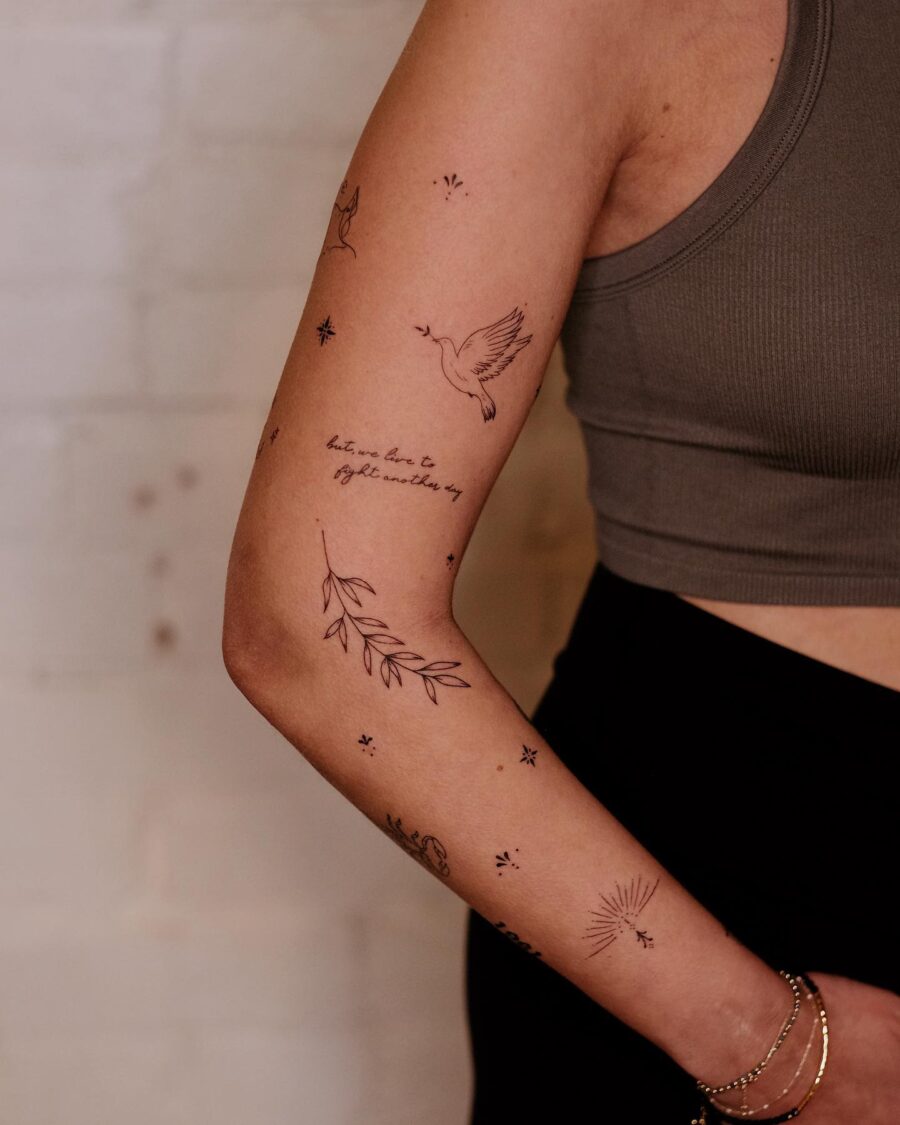 Delicate hidden tattoos with nature and script.