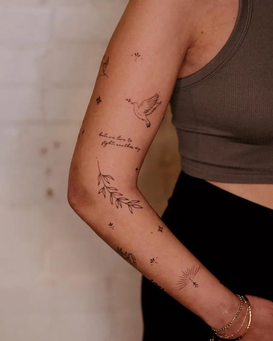 Delicate hidden tattoos with nature and script.