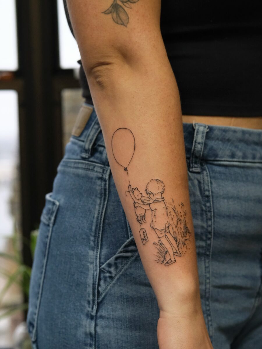 Heartfelt tribute through playful tattoo design