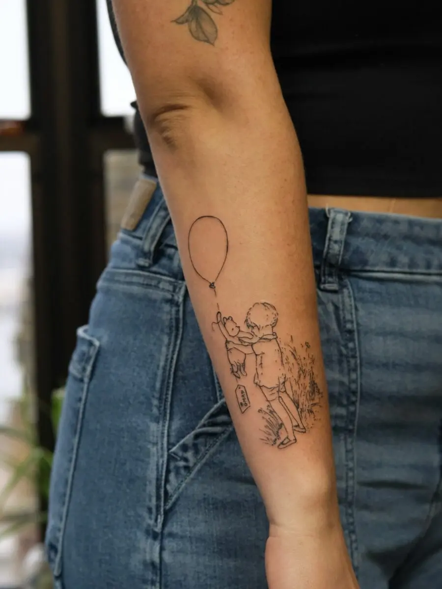 Heartfelt tribute through playful tattoo design