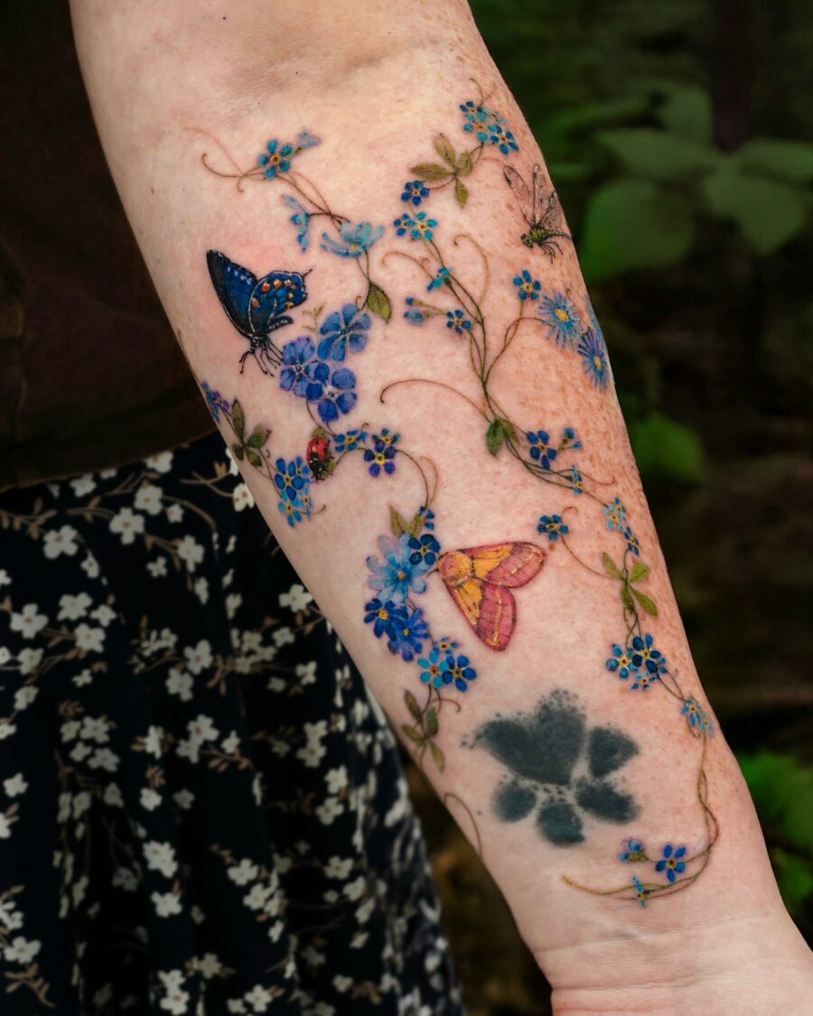 Vibrant Floral and Butterfly Memorial Tattoo