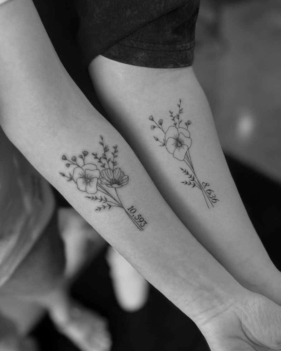 Floral tribute tattoos with meaningful dates