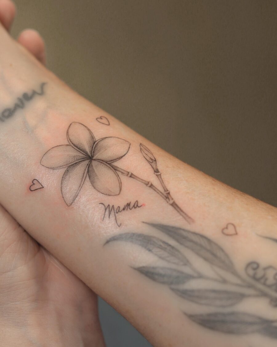 Elegant floral tribute tattoo for Mama.