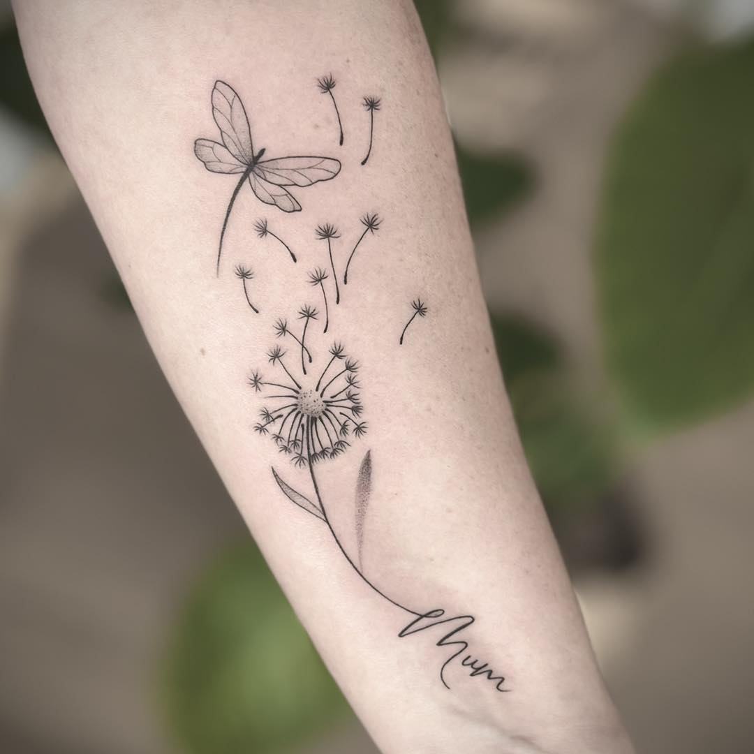 Elegant tribute with dandelion and dragonfly design