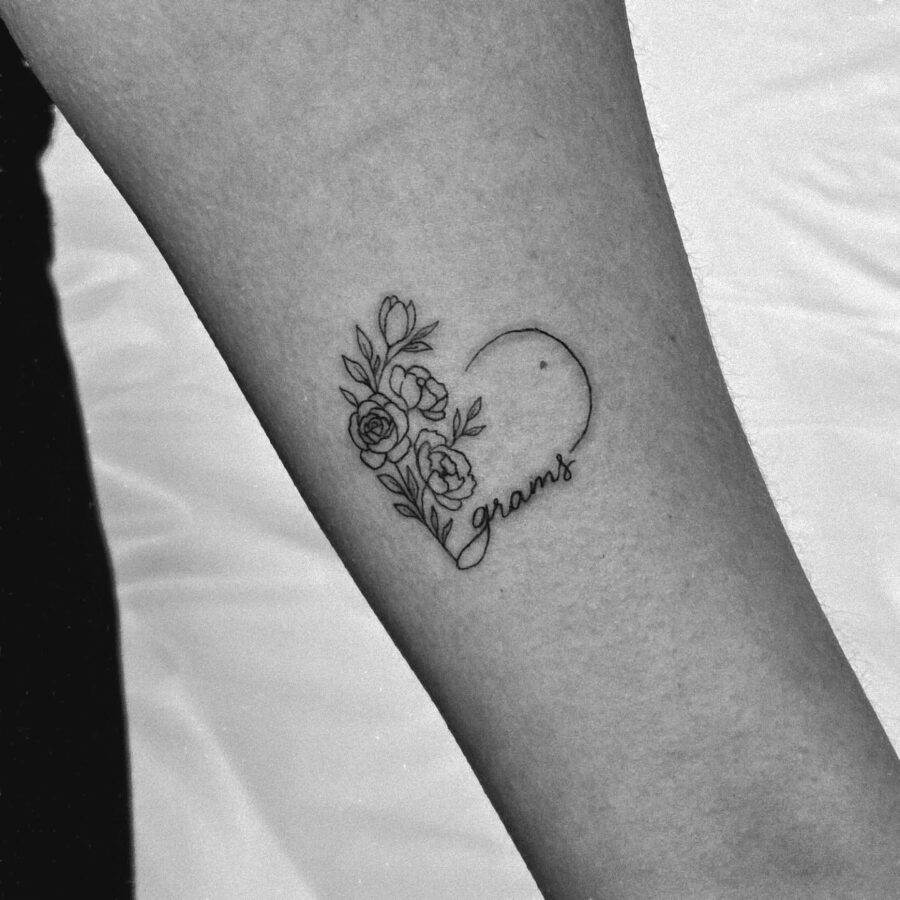 Floral heart tattoo honoring a beloved grandmother