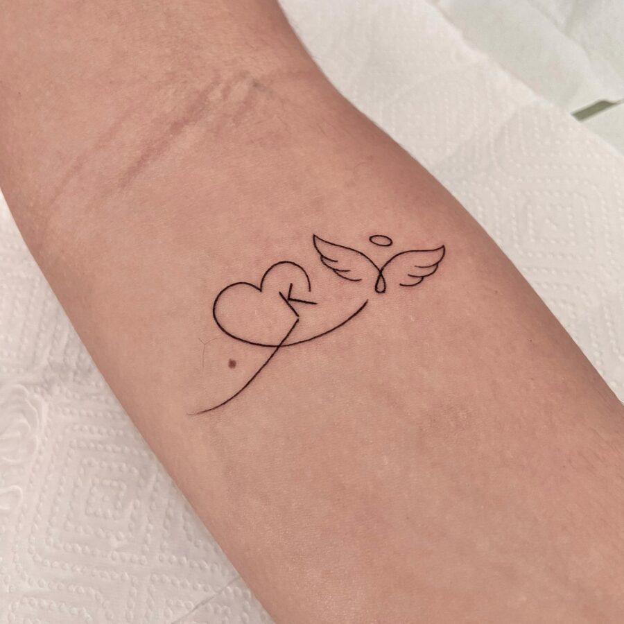 Minimalist Heart and Wing In Loving Memory Tattoo