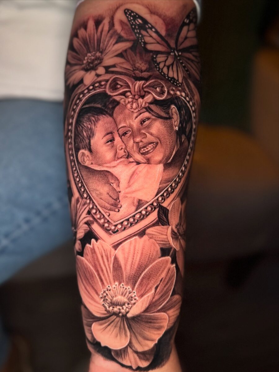 Heartfelt memorial tattoo of mother and child