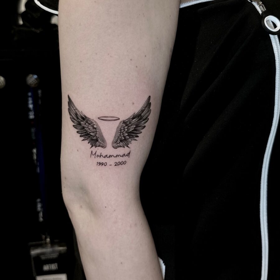 Elegant tribute with angel wings and halo