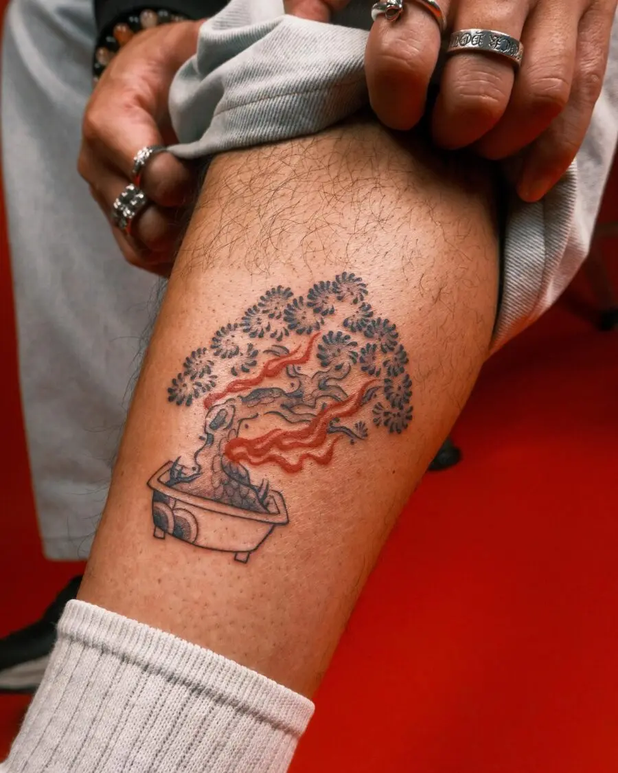 Symbolic bonsai tree tattoo with vibrant hues