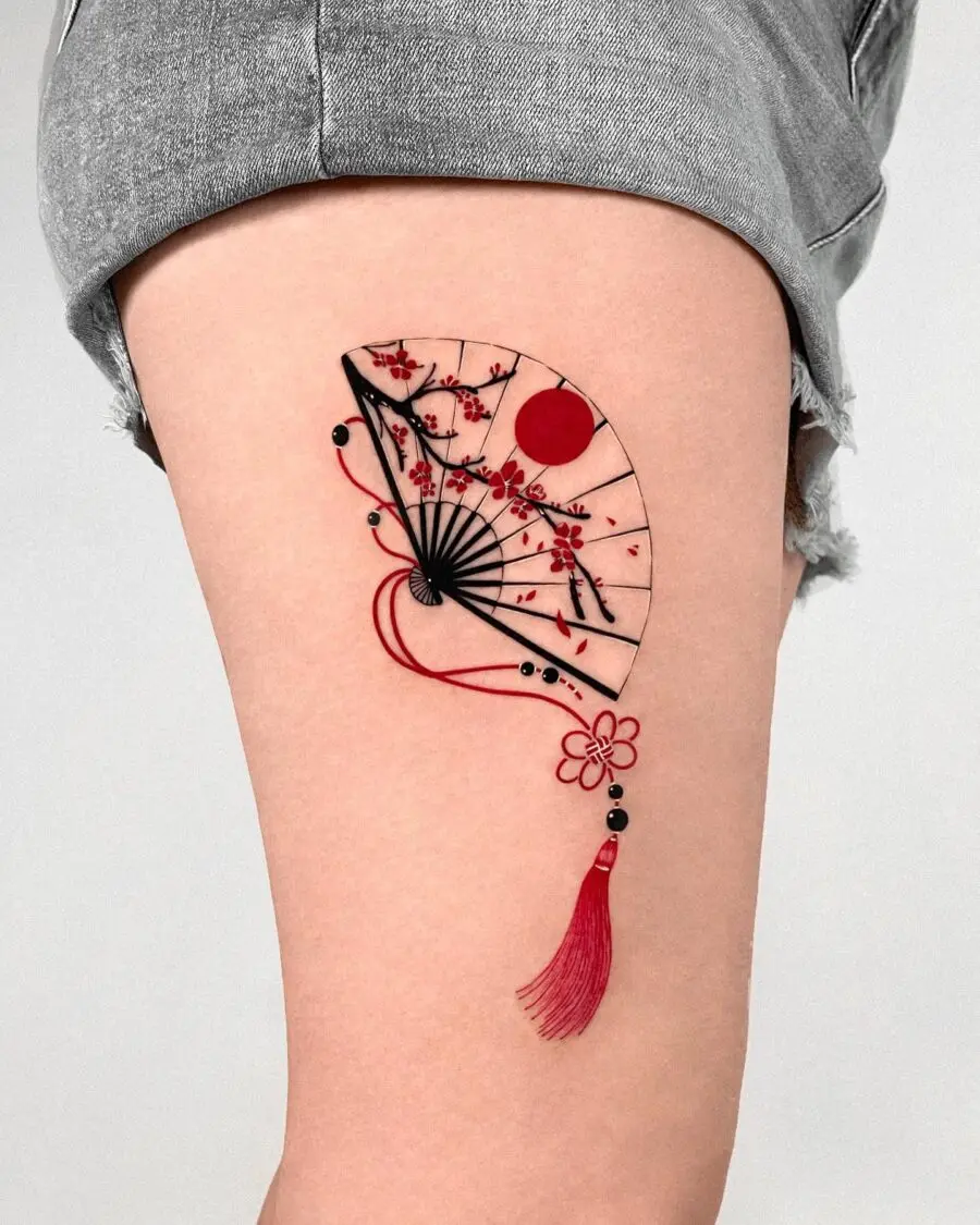 Elegant Japanese fan tattoo with floral details
