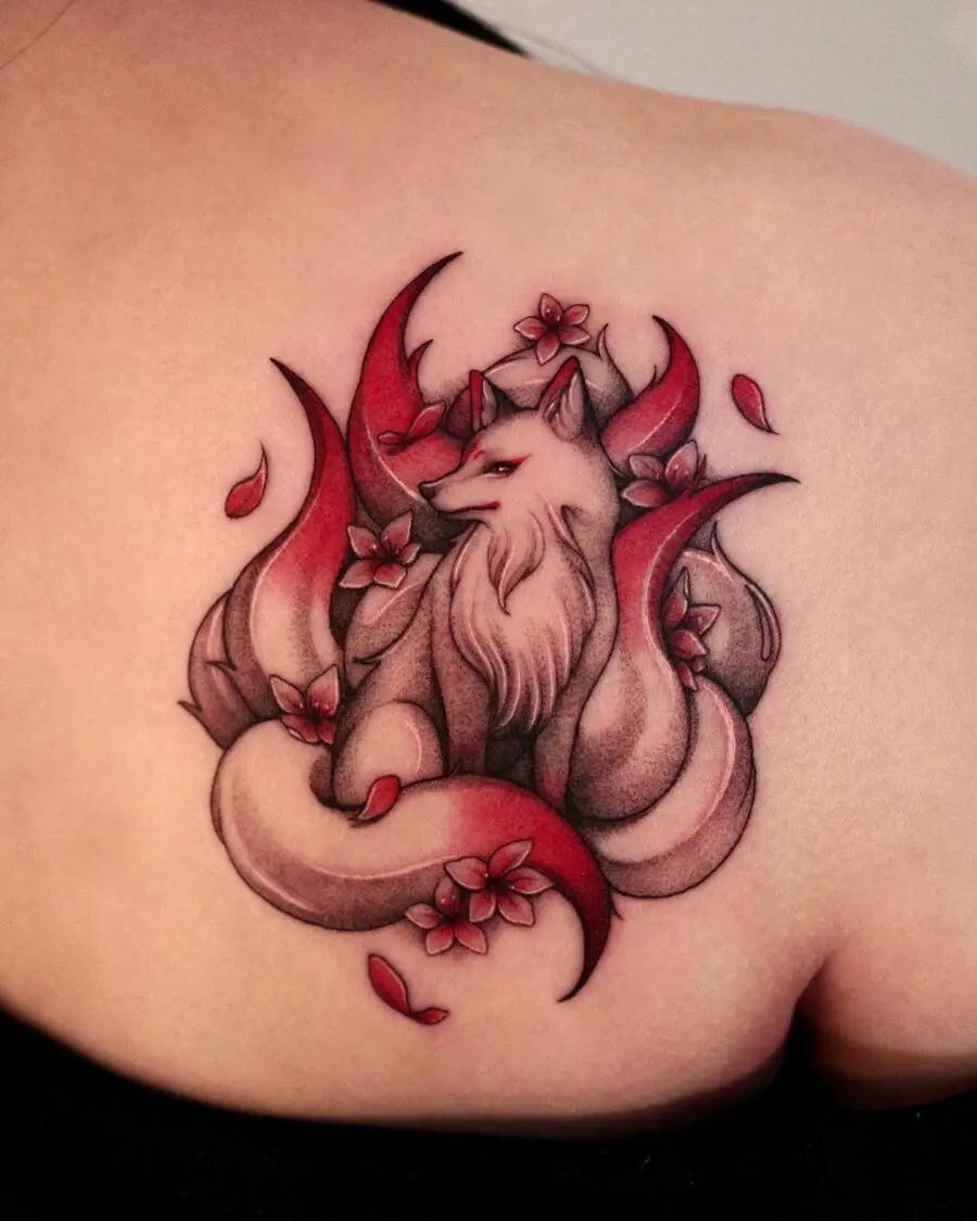 Elegant fox tattoo with cherry blossoms
