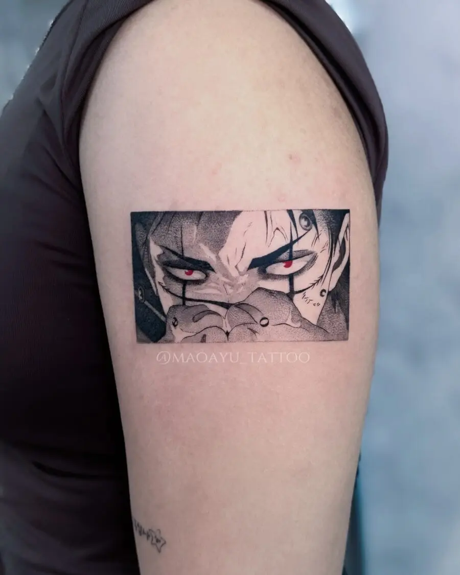 Dramatic anime character tattoo on the arm